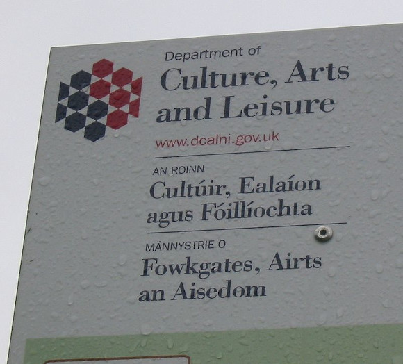 A sign for the Department of Culture, Arts and Leisure in Northern Ireland, in English, Irish and Ulster Scots.