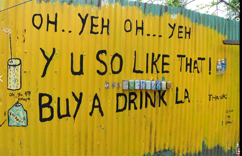 Lah (La) being used on an advertising board outside a cafe inPulau Ubin
