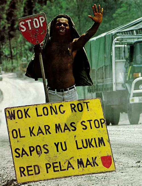 Sign in common use in the 1980s giving a warning in Tok Pisin