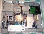 The internals of the original 20-inch iMac G5. Many hardware components can be seen