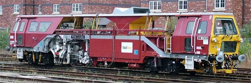 A track tamping machine in the sidings at Chester railway station