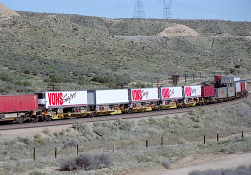 A train of intermodal trailers on flat cars. Also see TOFC