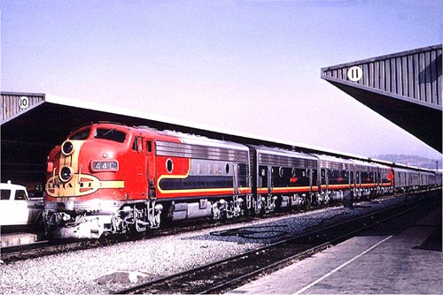 The combined Super Chief/El Capitan passenger train at Los Angeles Union Passenger Terminal in 1966 shows the red and silver warbonnet livery