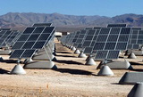 Solar array at Nellis Air Force Base. These panels track the sun in one axis. Credit: U.S. Air Force photo by Senior Airman Larry E. Reid Jr.